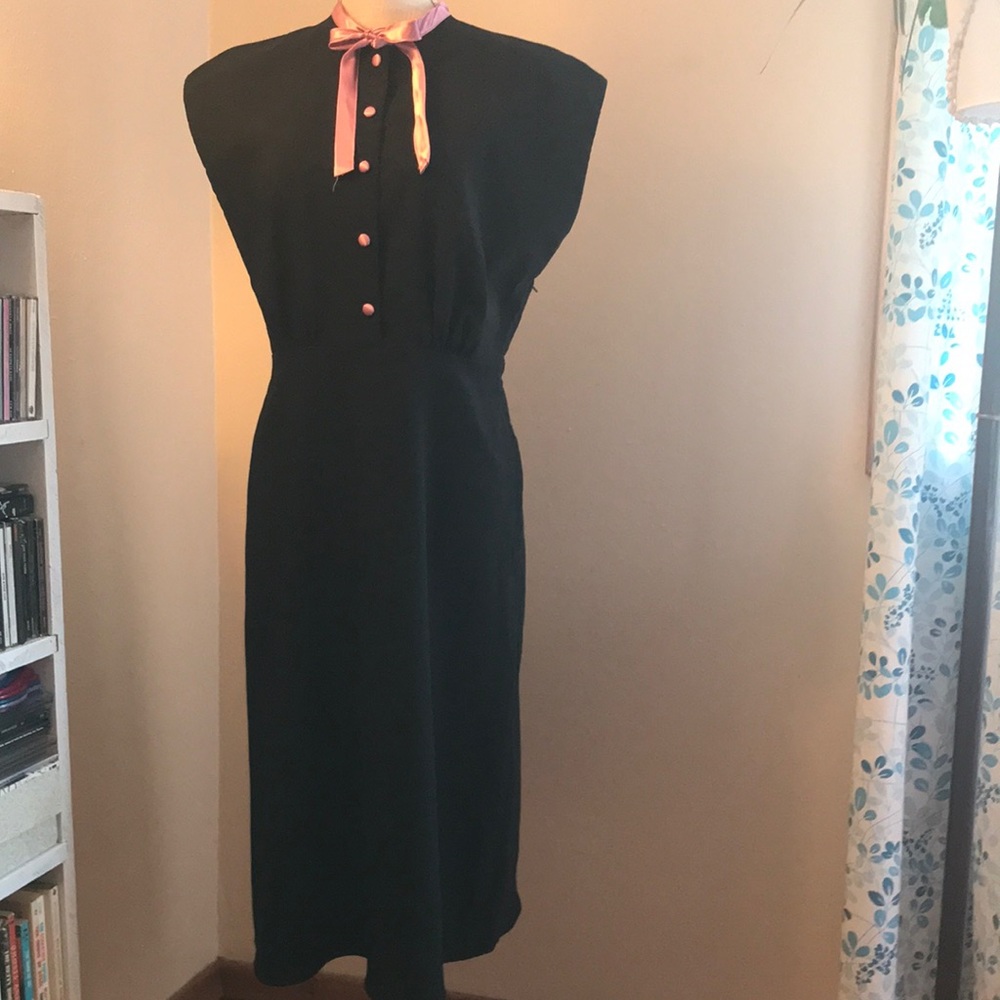 Stop Staring! brand XL black dress with pink satin detail.